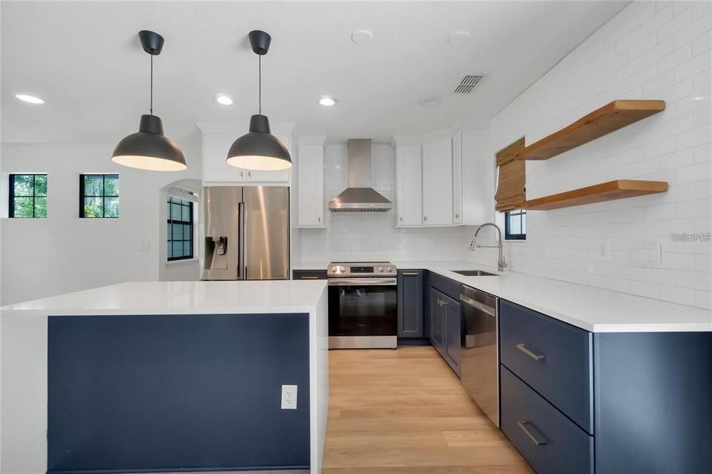 Interior, Kitchen, Pendant Lights, Recessed Lighting, Stainless Steel Appliances, Wood Texture Flooring