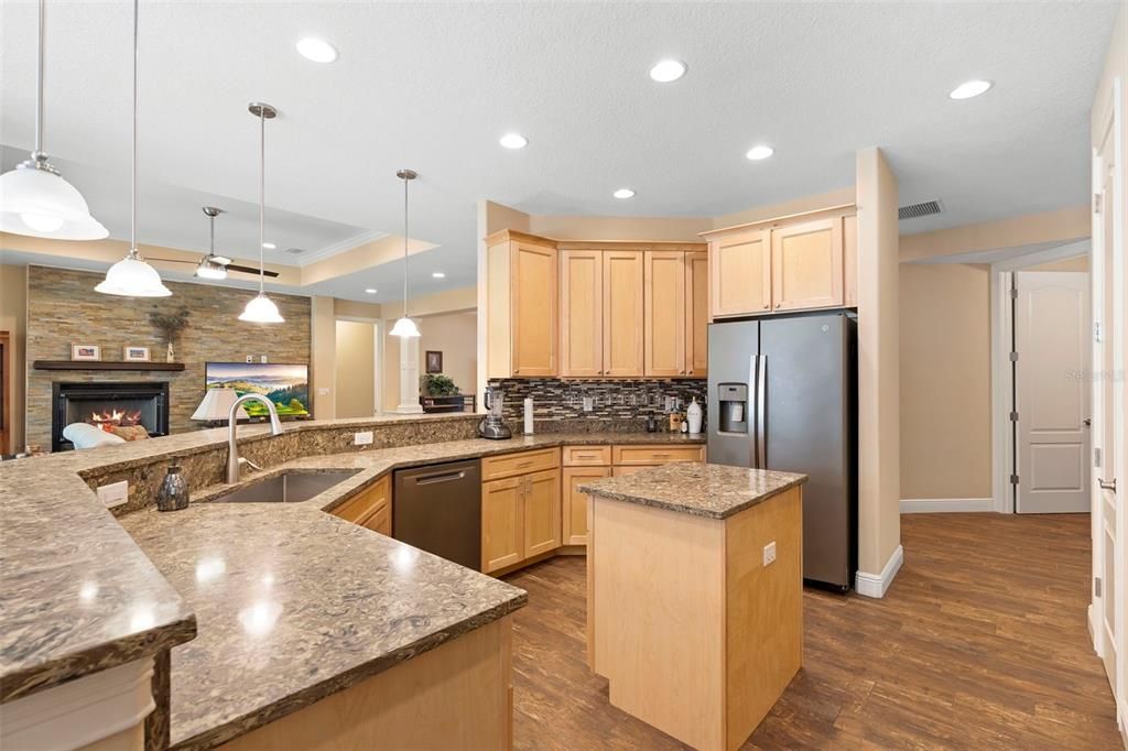 Fireplace, Interior, Kitchen, Pendant Lights, Recessed Lighting, Stone Walls, Wood Texture Flooring