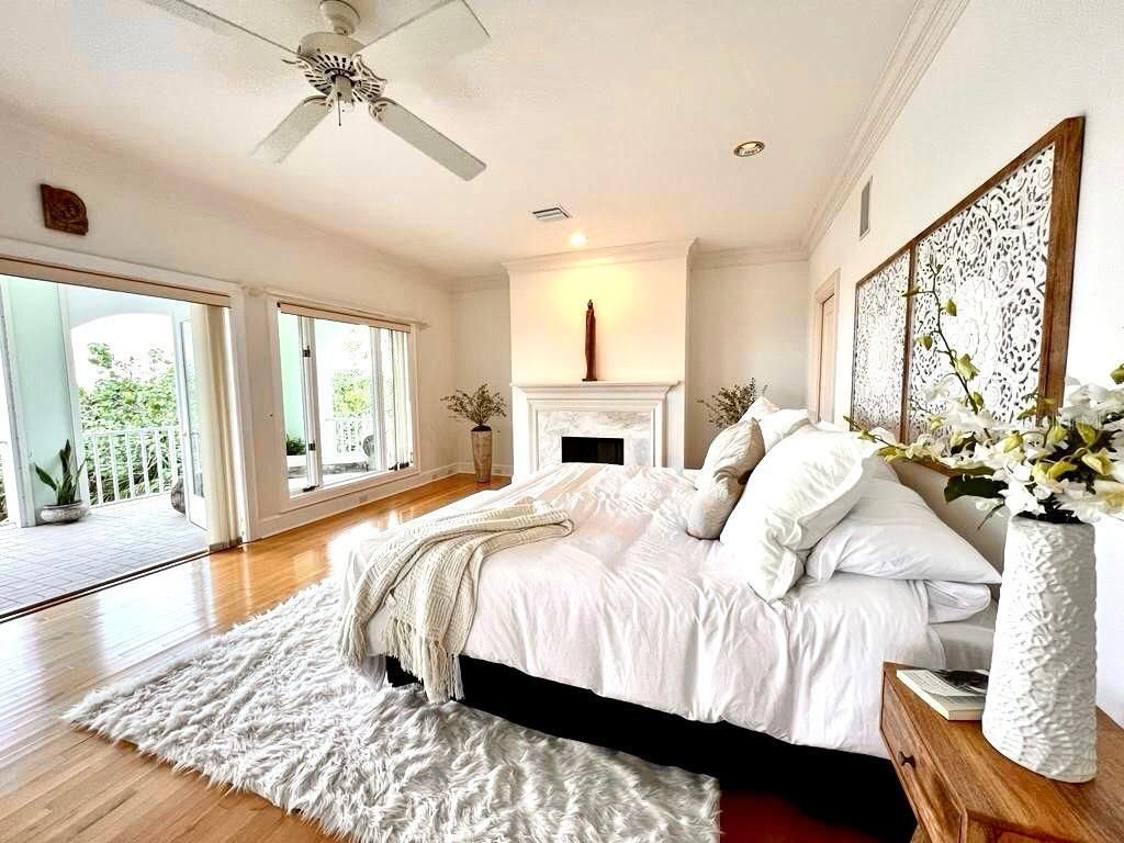 Bedroom, Fireplace, Interior, Recessed Lighting, Wood Texture Flooring