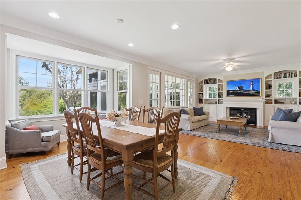 Dining room, Fireplace, Interior, Living room, Recessed Lighting, Wood Texture Flooring