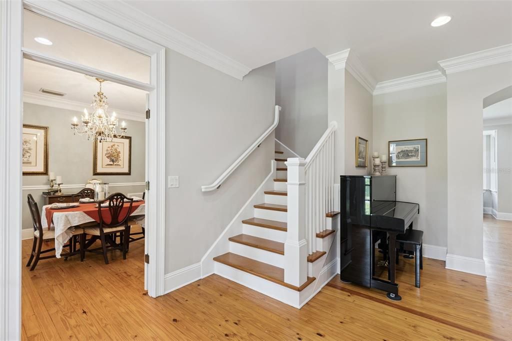 Chandelier, Dining room, Interior, Piano, Recessed Lighting, Wood Texture Flooring