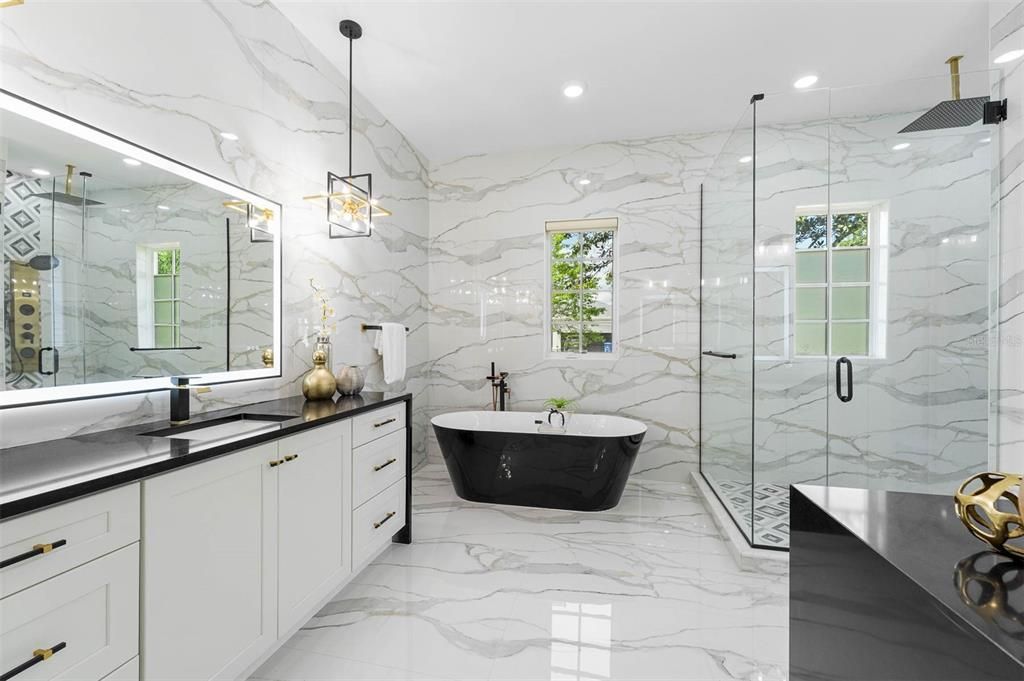 Bathroom, Dual Sink Vanities, Free Standing Baths, Glass Shower, Interior, Marble, Marble Walls, Recessed Lighting