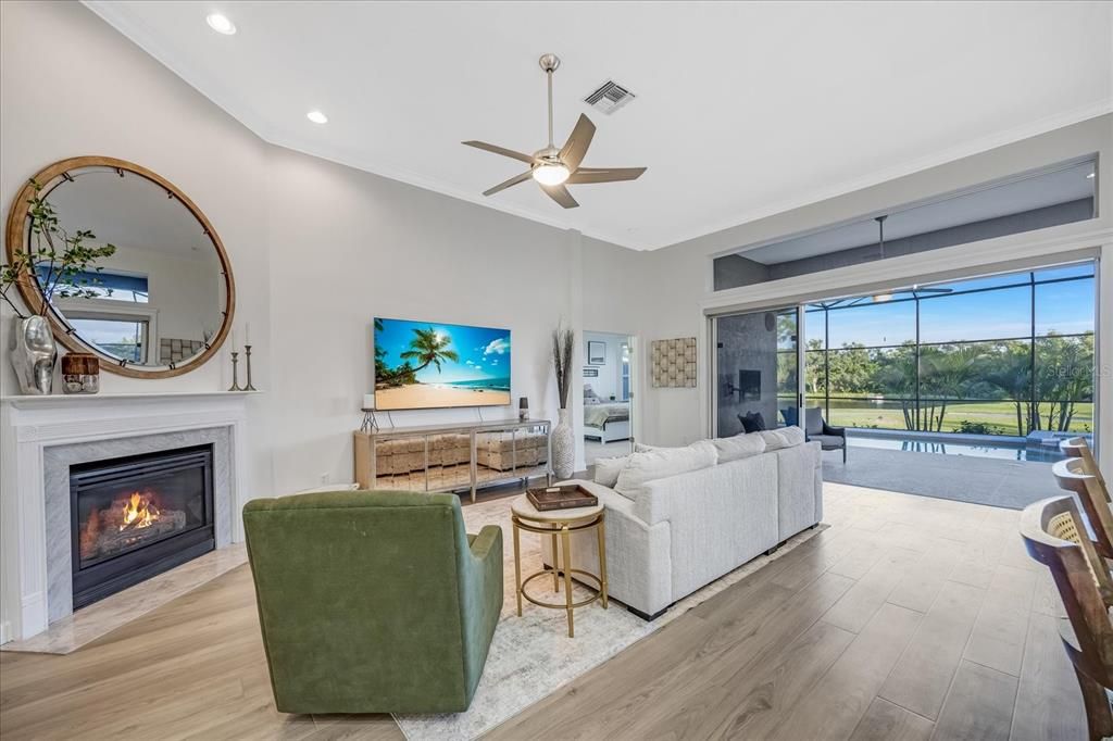 Fireplace, Interior, Living room, Recessed Lighting, Wood Texture Flooring