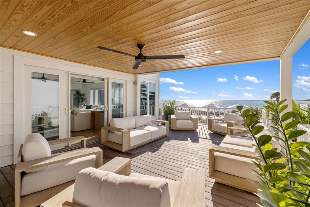 Exterior, Living room, Recessed Lighting, Water, Wood Texture Flooring