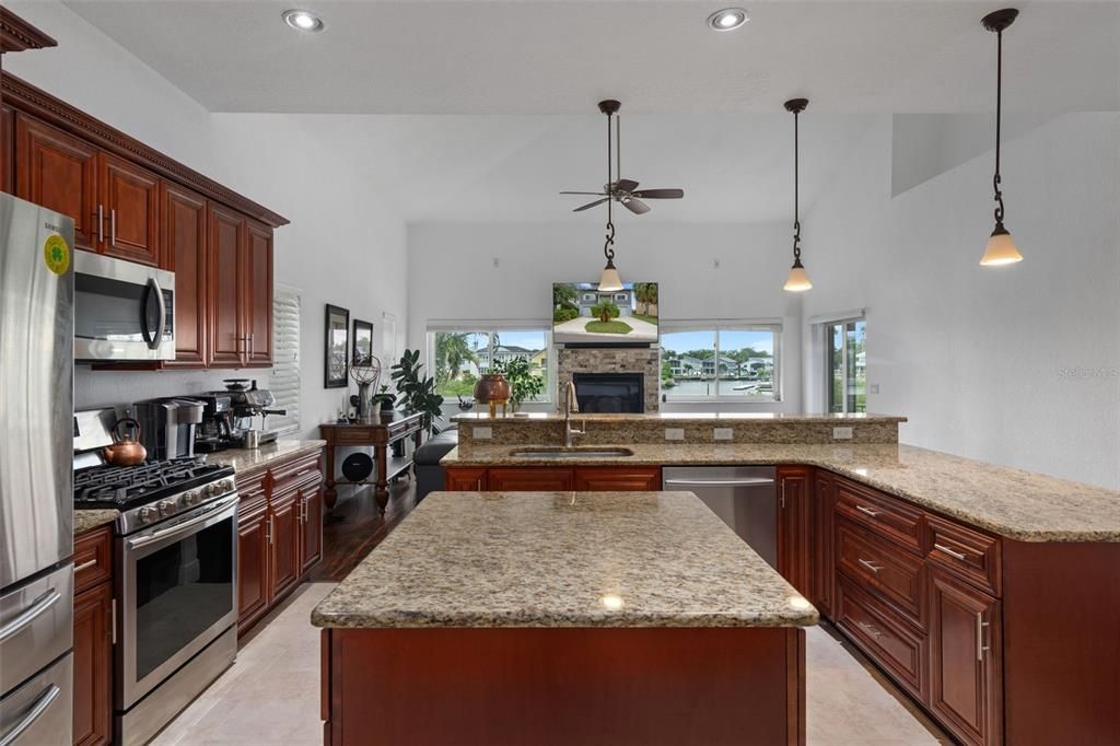 Fireplace, Interior, Kitchen, Pendant Lights, Recessed Lighting, Stainless Steel Appliances