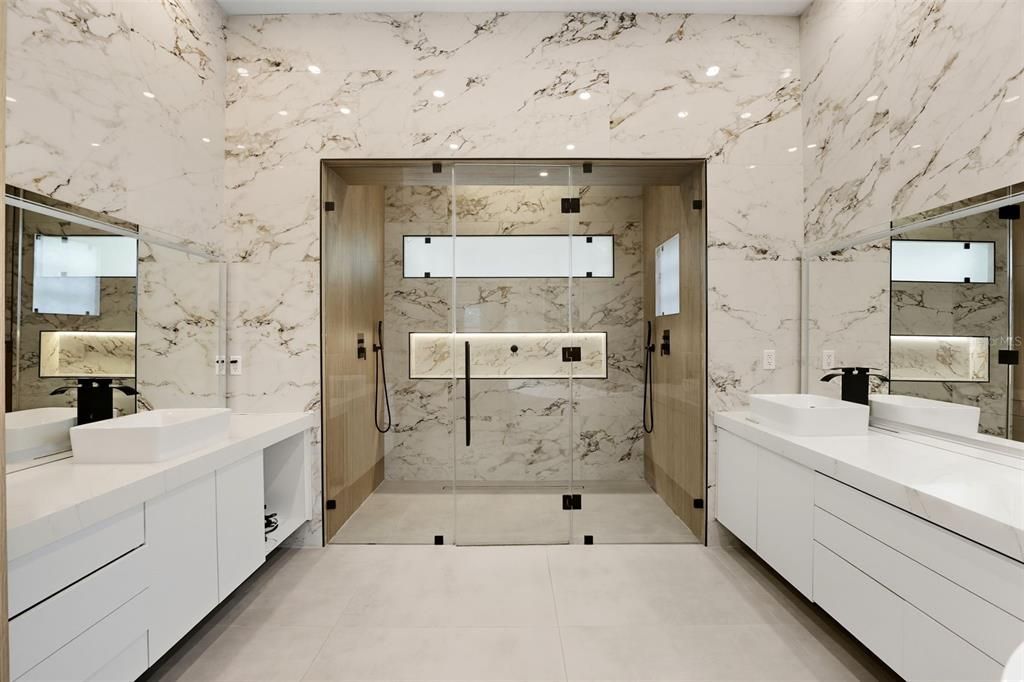 Bathroom, Dual Sink Vanities, Glass Shower, Interior, Marble Walls, Recessed Lighting
