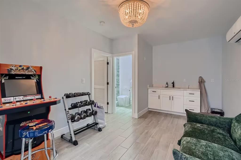 Bathroom, Chandelier, Fitness Equipment, Interior, Wood Texture Flooring