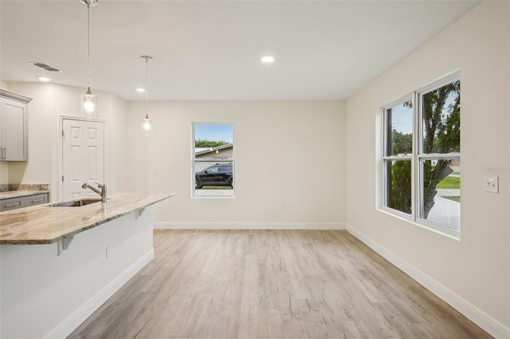 Empty room, Interior, Kitchen, Pendant Lights, Recessed Lighting, Wood Texture Flooring