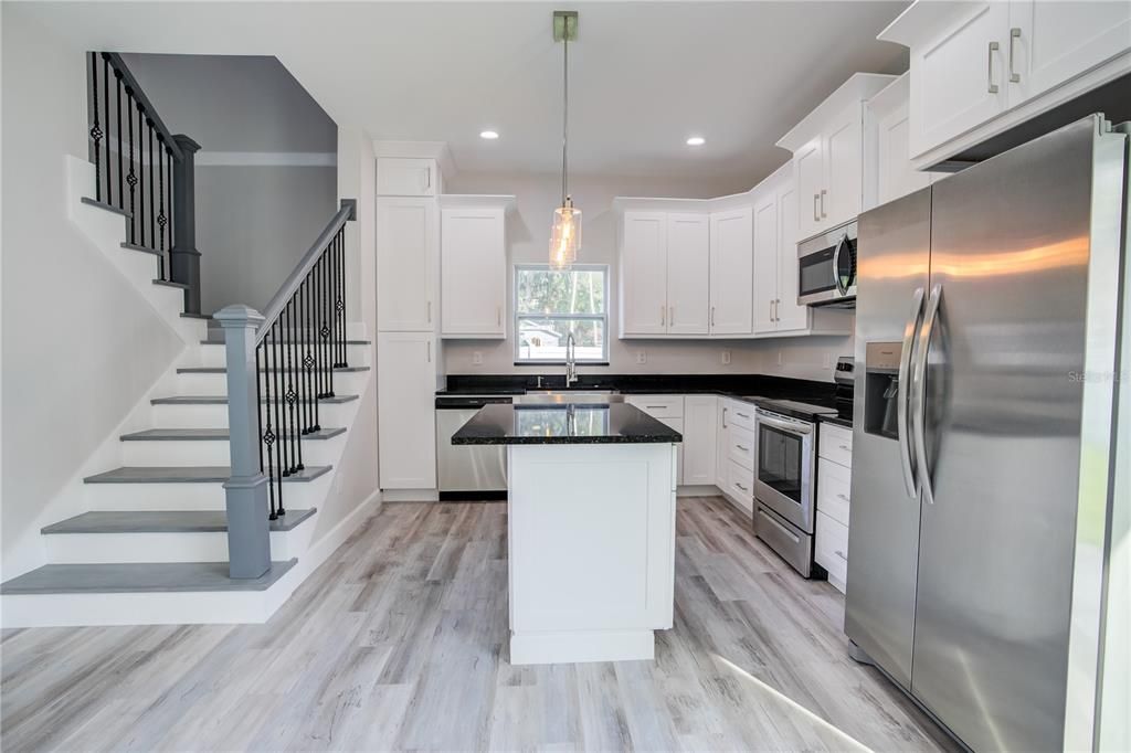 Interior, Kitchen, Pendant Lights, Recessed Lighting, Stainless Steel Appliances, Wood Texture Flooring