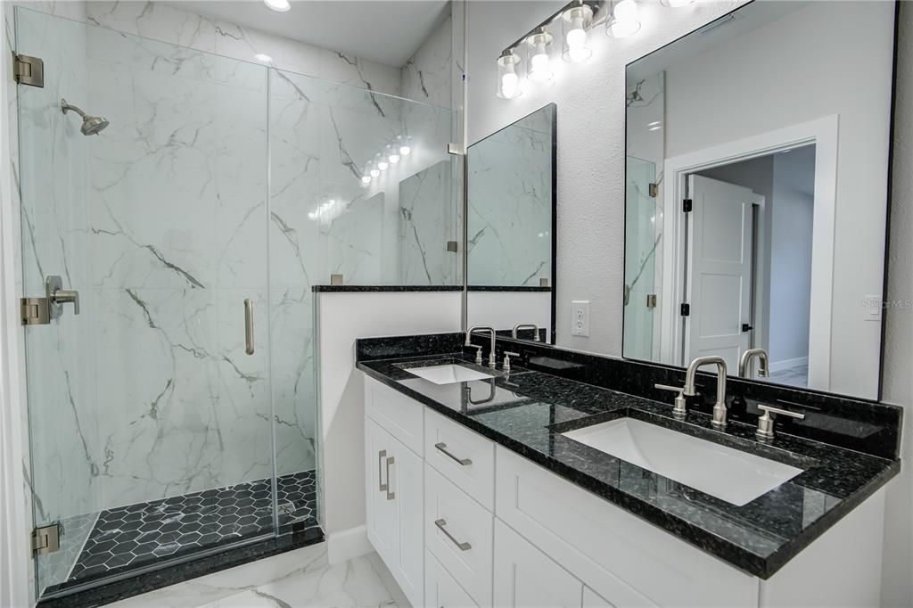 Bathroom, Dual Sink Vanities, Glass Shower, Interior, Marble, Marble Walls