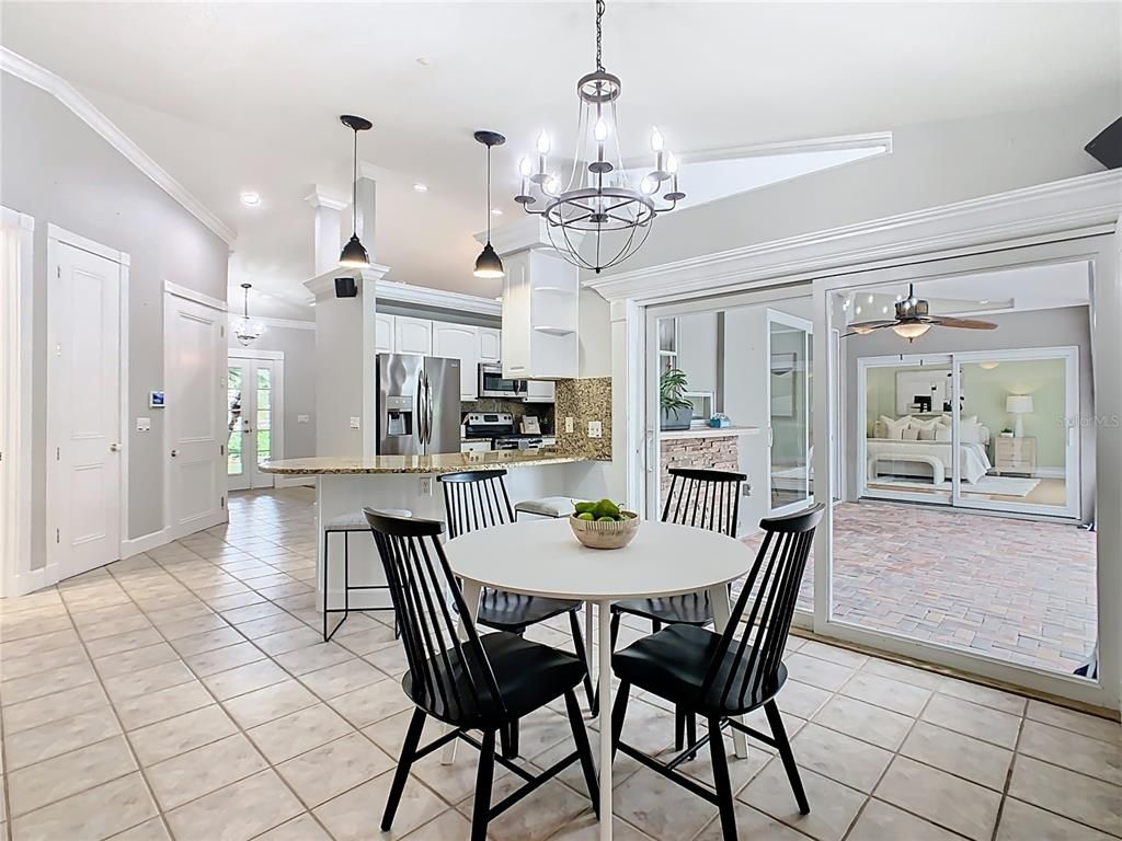 Chandelier, Dining room, Interior, Kitchen, Pendant Lights, Recessed Lighting, Stainless Steel Appliances