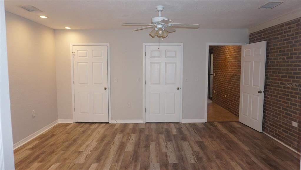 Empty room, Interior, Recessed Lighting, Stone Walls, Wood Texture Flooring