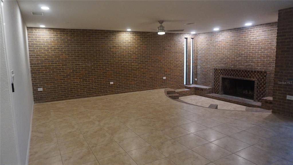 Empty room, Fireplace, Interior, Recessed Lighting, Stone Walls