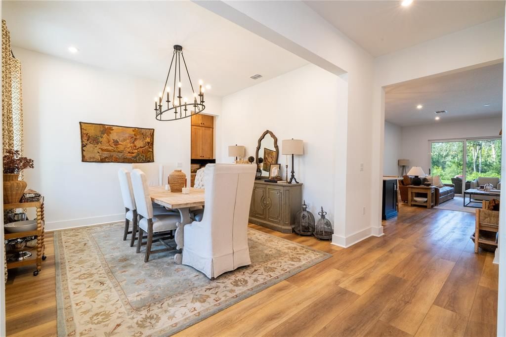 Chandelier, Dining room, Interior, Living room, Pendant Lights, Recessed Lighting, Wood Texture Flooring