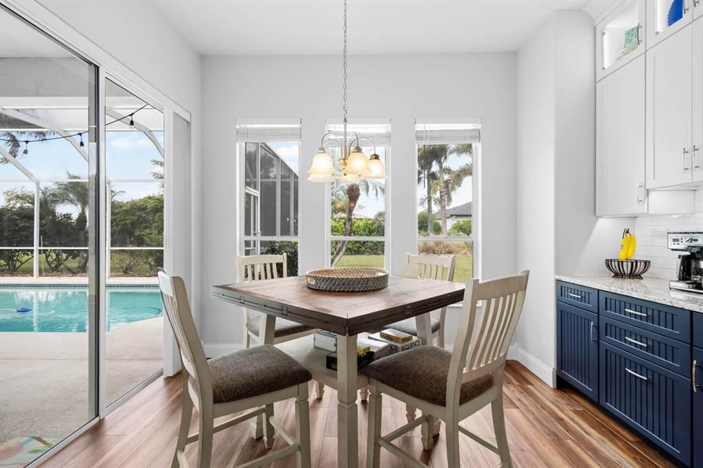 Dining room, Interior, Pendant Lights, Pool, Sun Room, Wood Texture Flooring