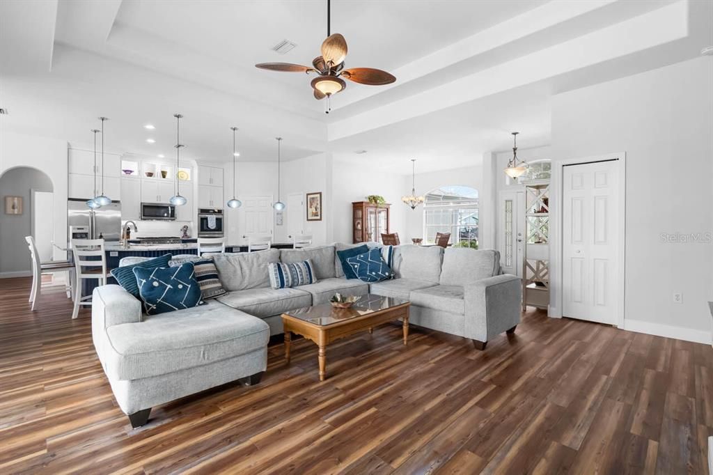 Dining room, Interior, Kitchen, Living room, Pendant Lights, Recessed Lighting, Stainless Steel Appliances, Wood Texture Flooring