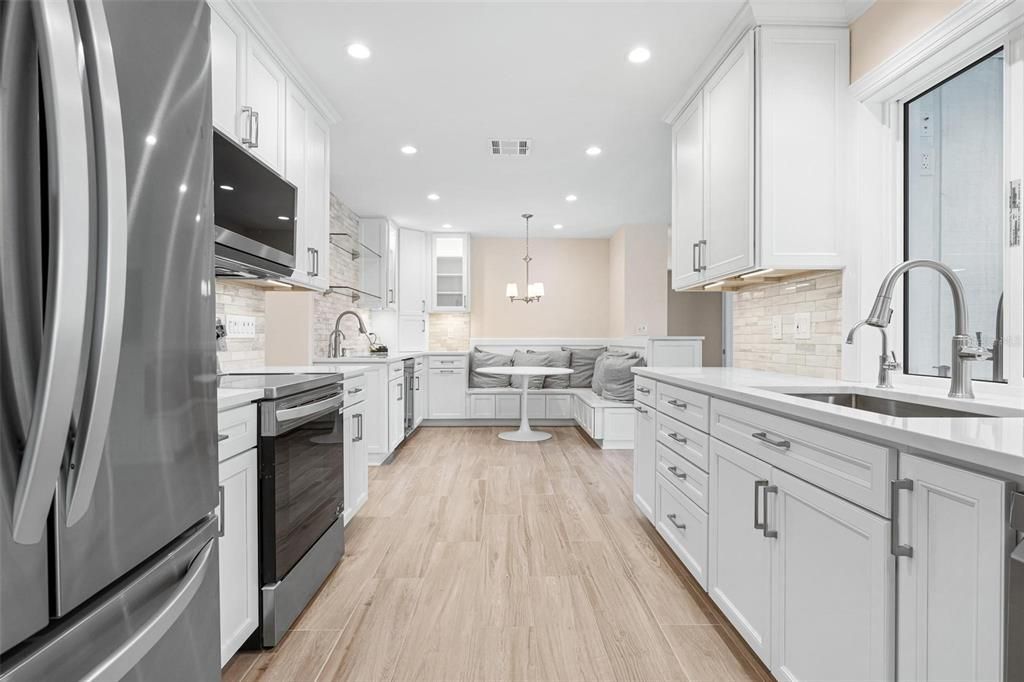 Interior, Kitchen, Pendant Lights, Recessed Lighting, Stainless Steel Appliances, Wood Texture Flooring