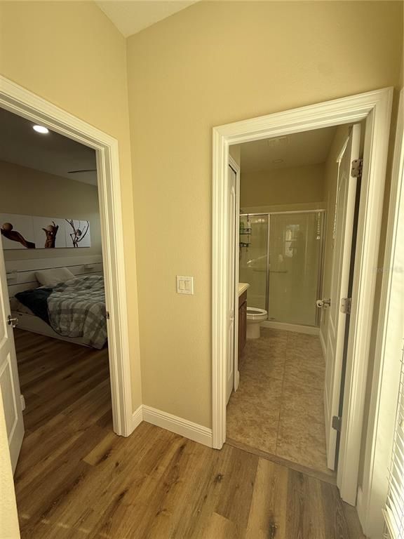 Bathroom, Glass Shower, Interior, Recessed Lighting, Wood Texture Flooring