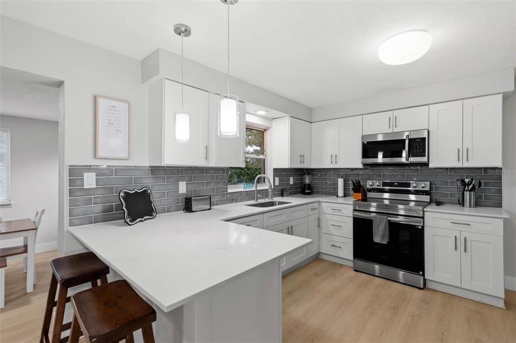 Interior, Kitchen, Pendant Lights, Stainless Steel Appliances, Wood Texture Flooring