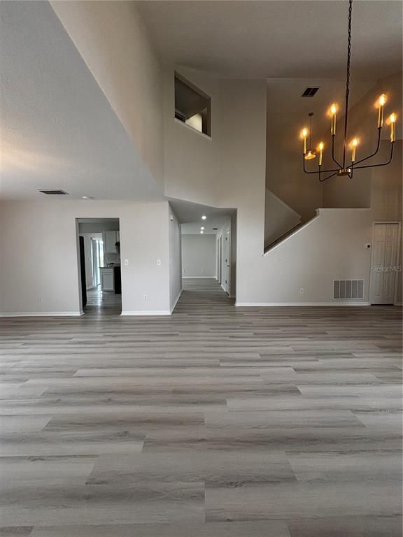 Chandelier, Empty room, Interior, Pendant Lights, Wood Texture Flooring