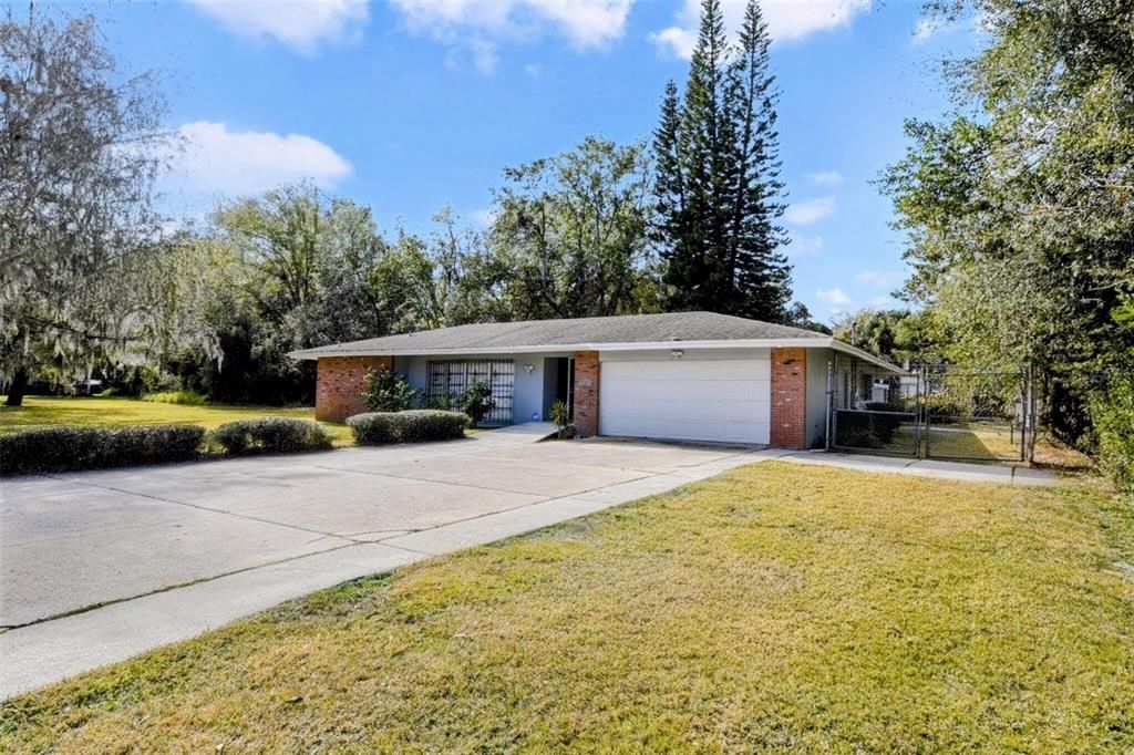 Attached, Backyard, Exterior, Facade, Brick Facade, Ranch