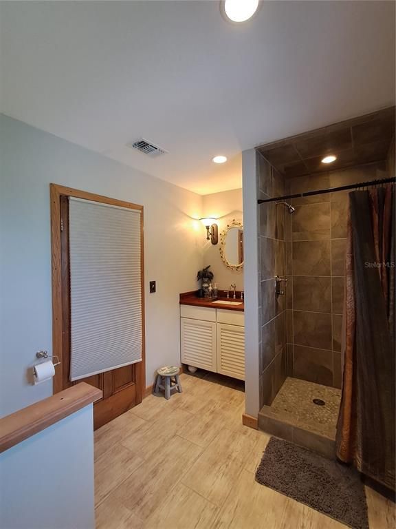 Bathroom, Glass Shower, Interior, Recessed Lighting, Wood Texture Flooring