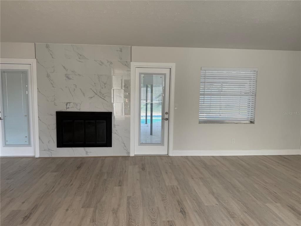 Empty room, Fireplace, Interior, Marble Walls, Wood Texture Flooring