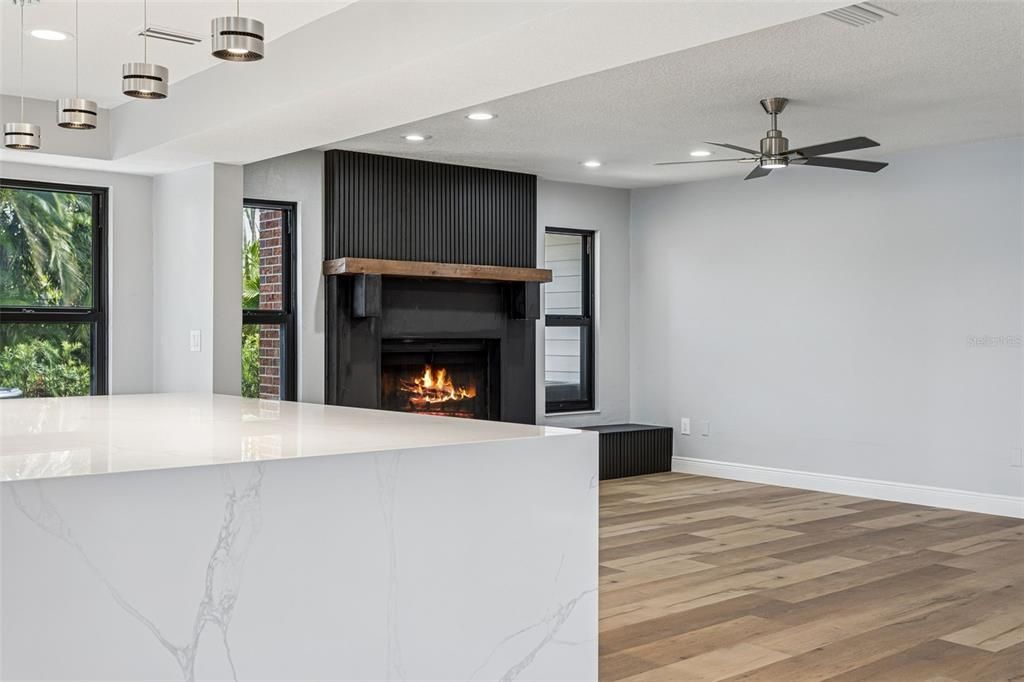 Fireplace, Interior, Pendant Lights, Recessed Lighting, Wood Texture Flooring