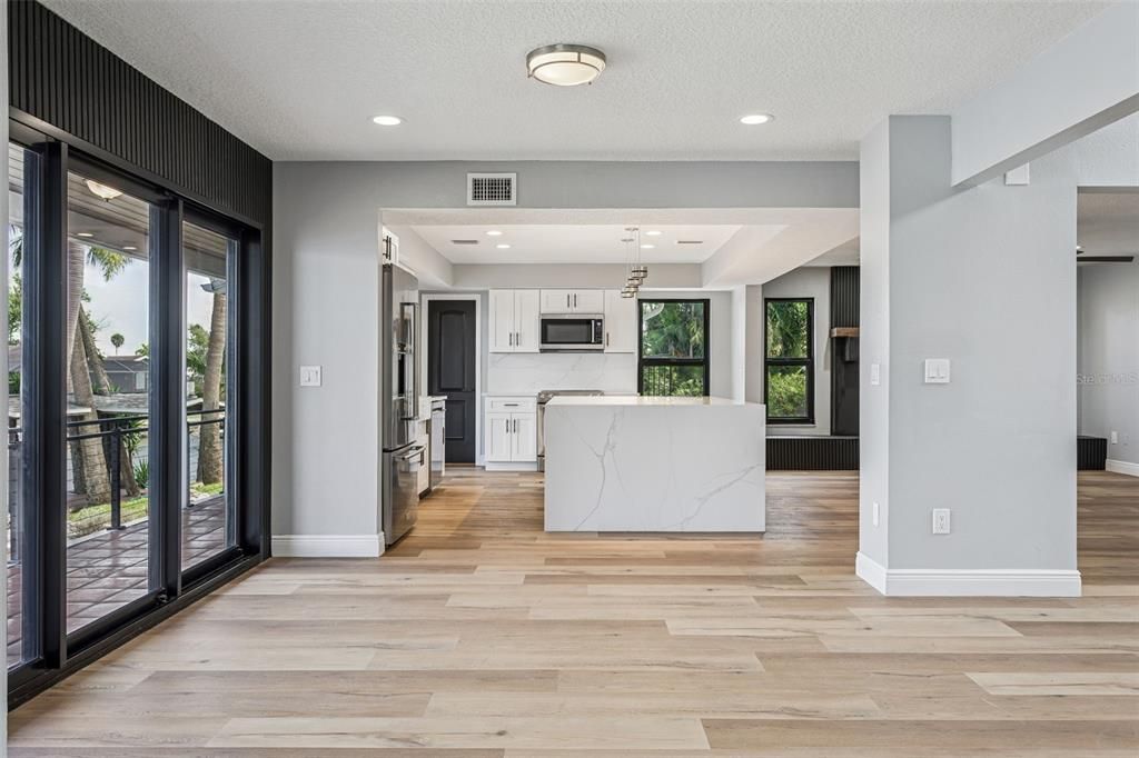 Interior, Kitchen, Marble Walls, Pendant Lights, Recessed Lighting, Wood Texture Flooring