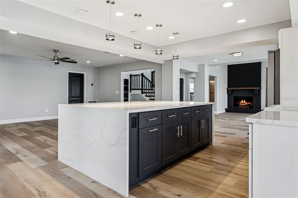 Fireplace, Interior, Kitchen, Pendant Lights, Recessed Lighting, Wood Texture Flooring