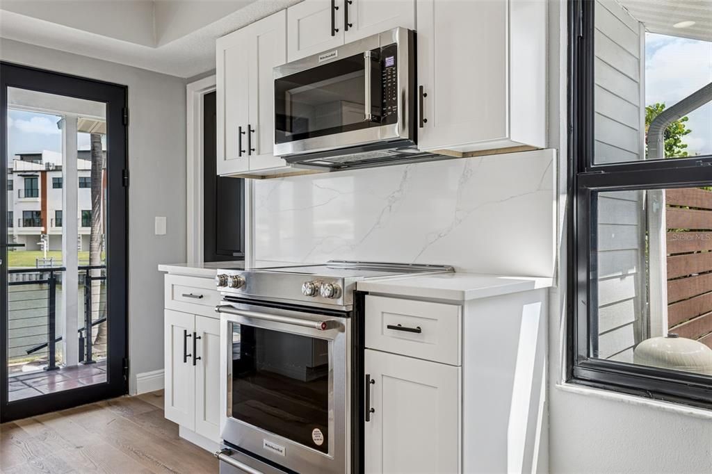 Interior, Kitchen, Marble Walls, Stainless Steel Appliances, Wood Texture Flooring