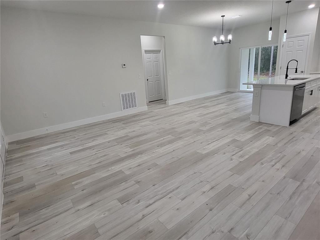Chandelier, Empty room, Interior, Kitchen, Pendant Lights, Recessed Lighting, Wood Texture Flooring