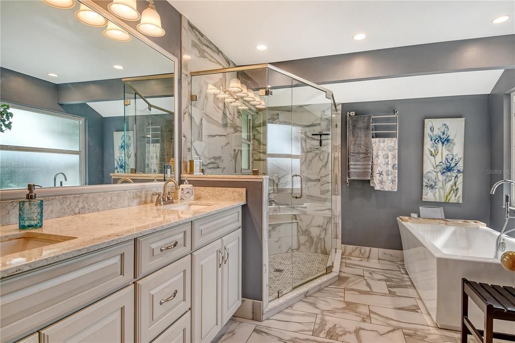 Bathroom, Dual Sink Vanities, Glass Shower, Interior, Marble, Marble Walls, Recessed Lighting