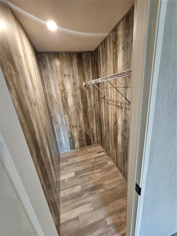 Interior, Recessed Lighting, Walk-in Closets, Wood Texture Flooring, Wooden Walls