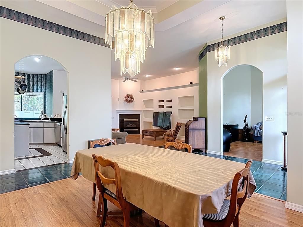 Chandelier, Dining room, Fireplace, Interior, Pendant Lights, Recessed Lighting, Wood Texture Flooring