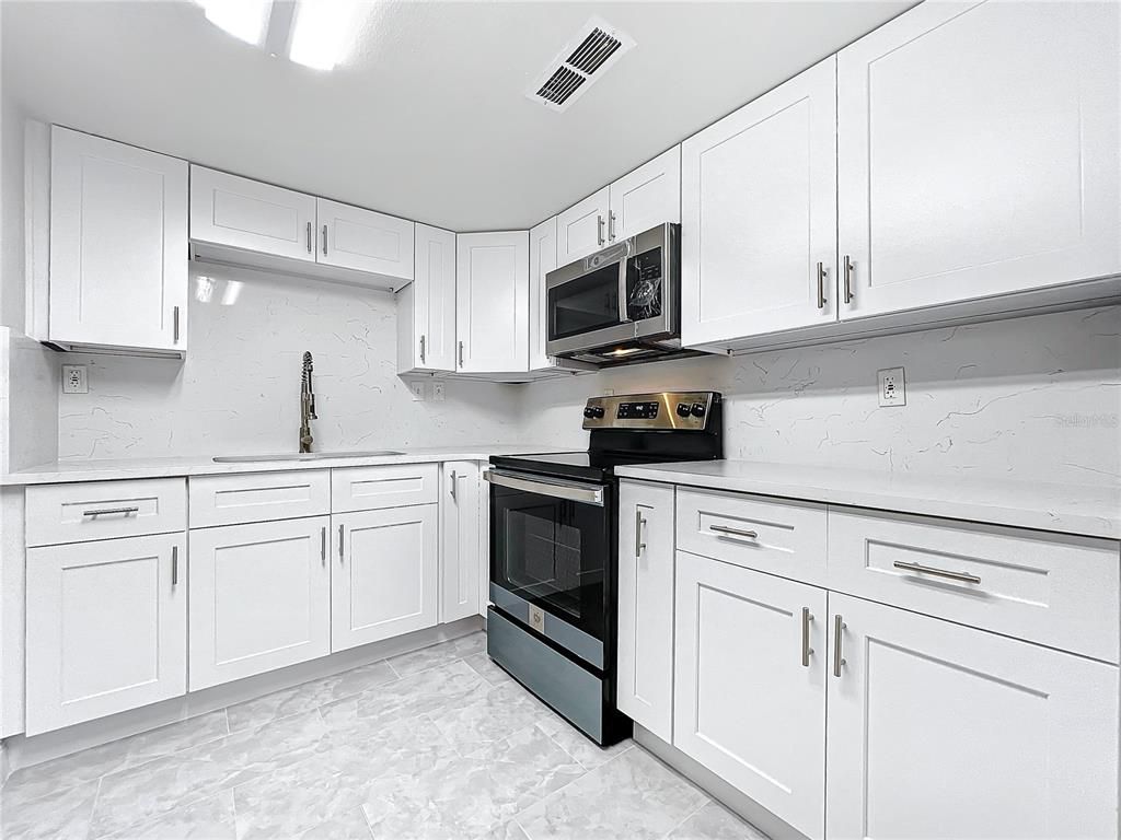 Interior, Kitchen, Marble, Marble Walls, Stainless Steel Appliances