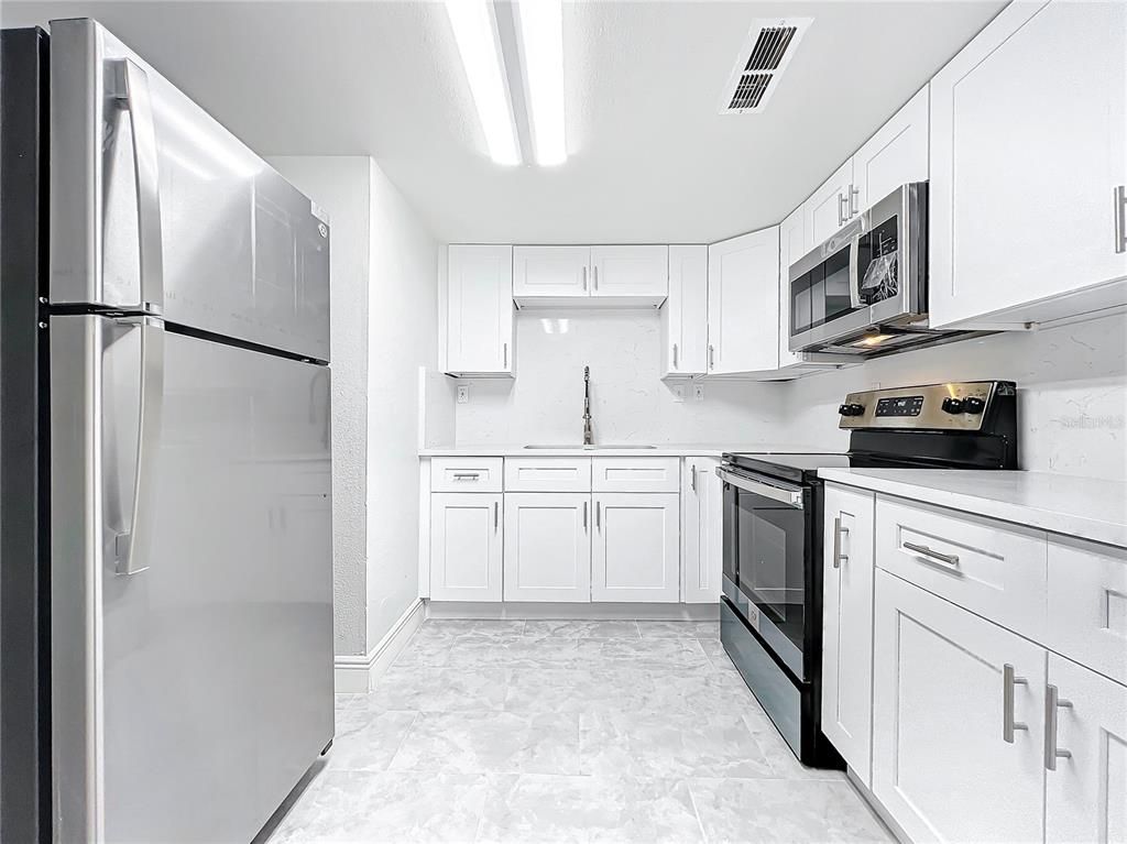 Interior, Kitchen, Marble, Marble Walls, Stainless Steel Appliances