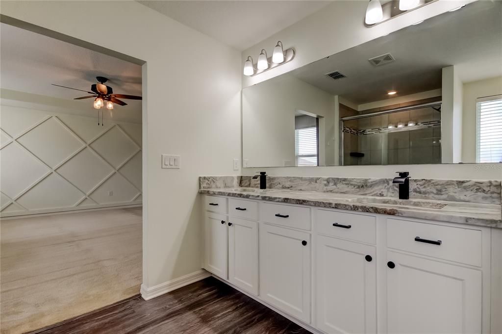 Bathroom, Dual Sink Vanities, Interior, Recessed Lighting, Wood Texture Flooring