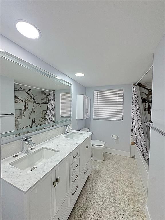 Bathroom, Dual Sink Vanities, Interior, Marble Walls, Recessed Lighting