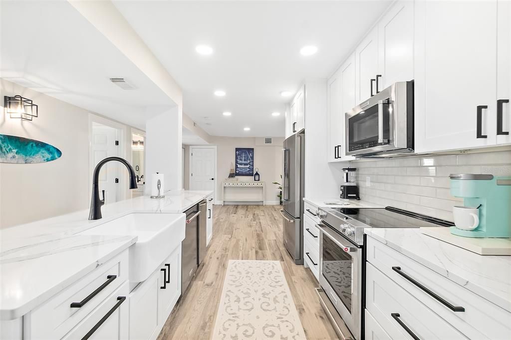 Interior, Kitchen, Recessed Lighting, Stainless Steel Appliances, Wood Texture Flooring