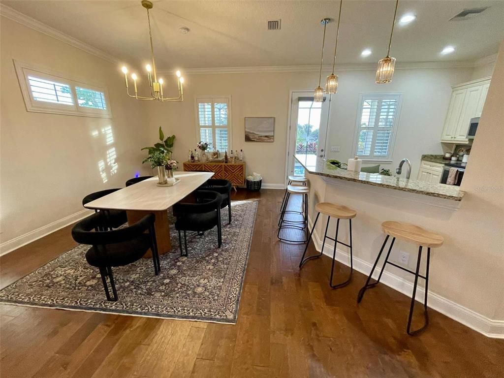 Chandelier, Dining room, Interior, Pendant Lights, Recessed Lighting, Wood Texture Flooring