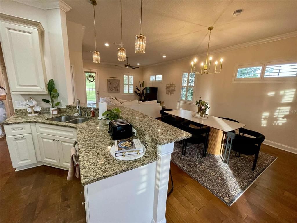 Dining room, Interior, Living room, Pendant Lights, Recessed Lighting, Wood Texture Flooring