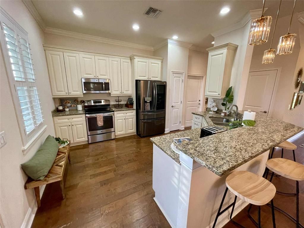 Interior, Kitchen, Pendant Lights, Recessed Lighting, Stainless Steel Appliances, Wood Texture Flooring