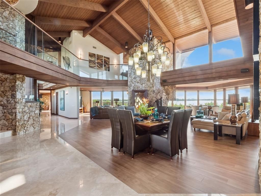 Chandelier, Dining room, Fireplace, Interior, Living room, Stone Walls, Wooden Beams, Wooden Ceilings, Wood Texture Flooring