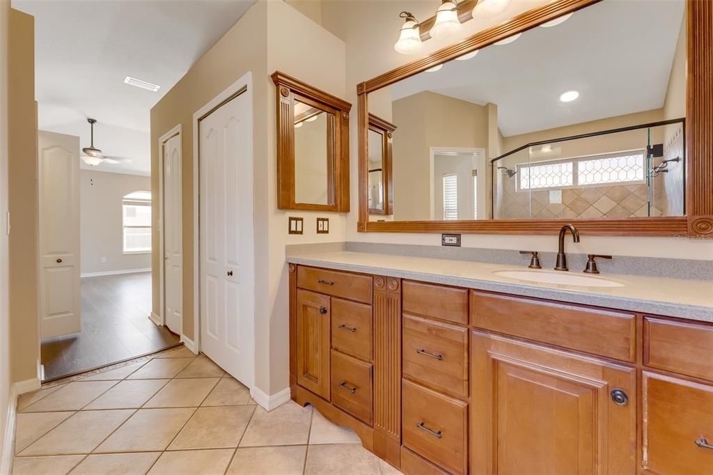Bathroom, Dual Sink Vanities, Interior, Recessed Lighting, Wood Texture Flooring