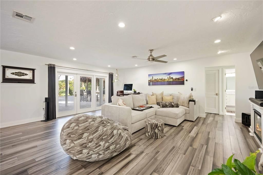 Fireplace, Interior, Living room, Recessed Lighting, Wood Texture Flooring