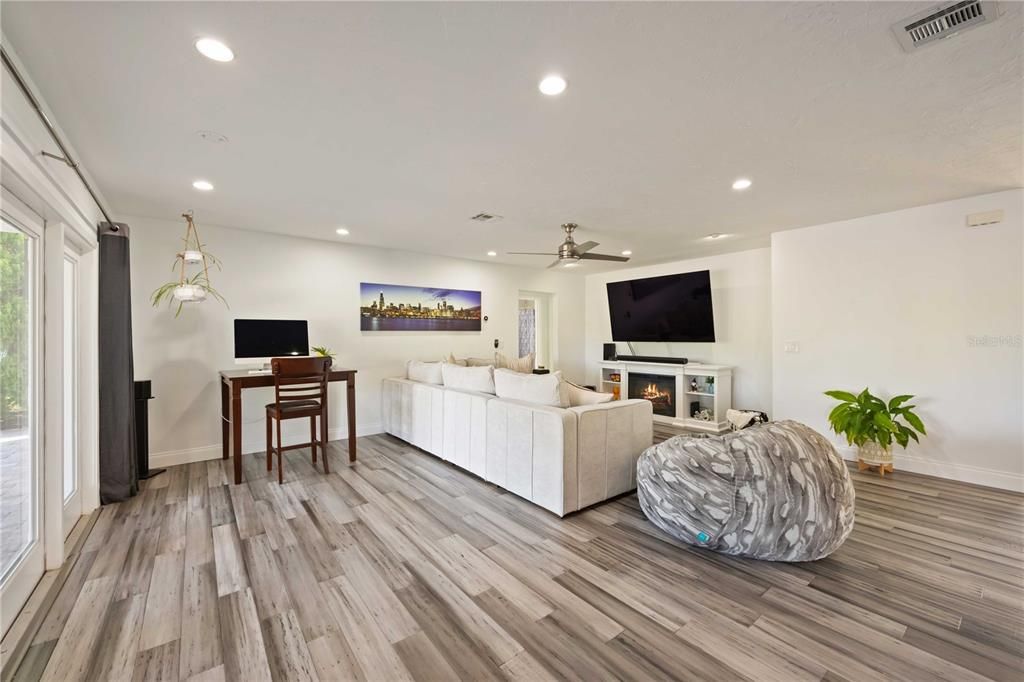 Fireplace, Interior, Living room, Recessed Lighting, Wood Texture Flooring