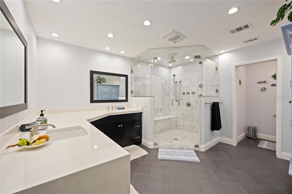Bathroom, Dual Sink Vanities, Glass Shower, Interior, Marble Walls, Recessed Lighting