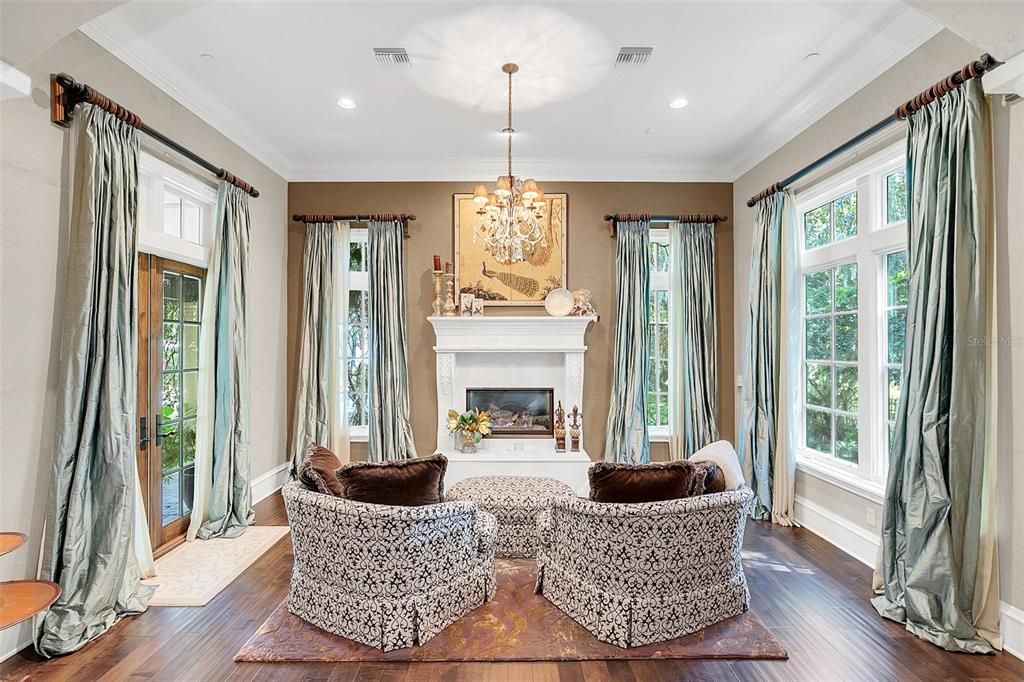 Chandelier, Fireplace, Interior, Living room, Recessed Lighting, Wood Texture Flooring