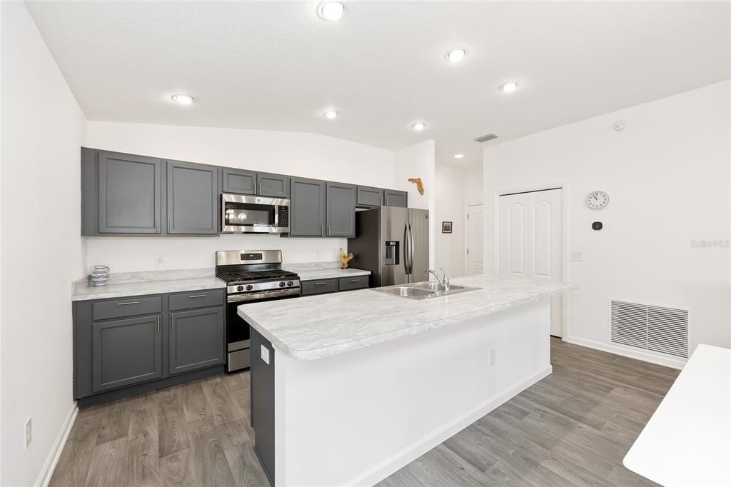 Interior, Kitchen, Recessed Lighting, Stainless Steel Appliances, Wood Texture Flooring